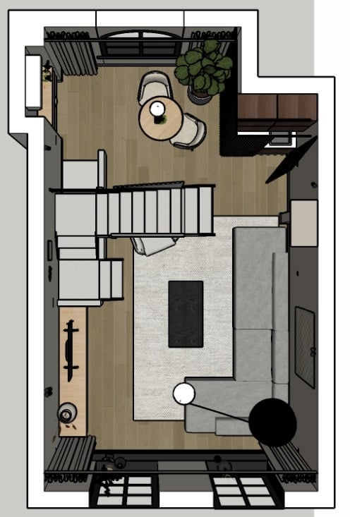 Bovenaanzicht van de woning in kleur en materiaal: houten vloer, lichte vloerkleden, een grijze hoekbank en de trap in het midden.